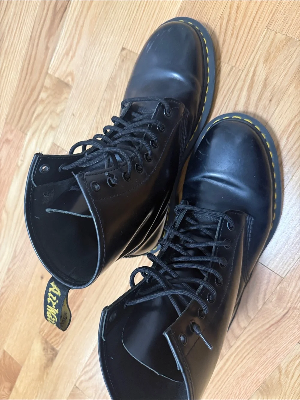 Dr. Martens Black Leather 8-Eye Lace-Up Boots with Yellow Stitching